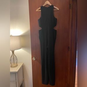 Express jumpsuit. Cutout sizes. Wide leg. Black. Size M. Pockets!